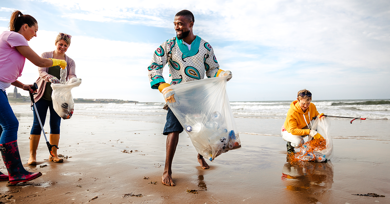 Beach clean. Beach Cleaning. The cleanest Beach. People Cleaning the Beach. Beach clean up.